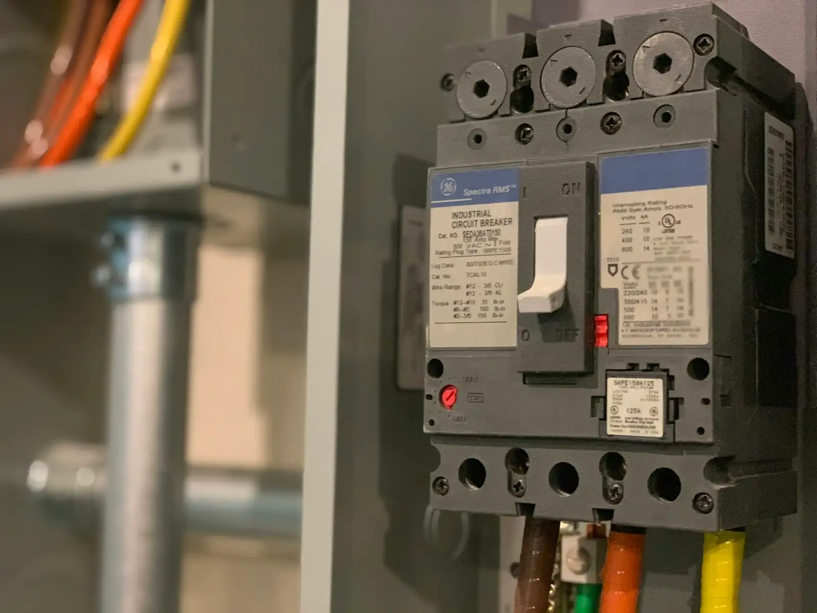 A circuit breaker and its nameplate, close up