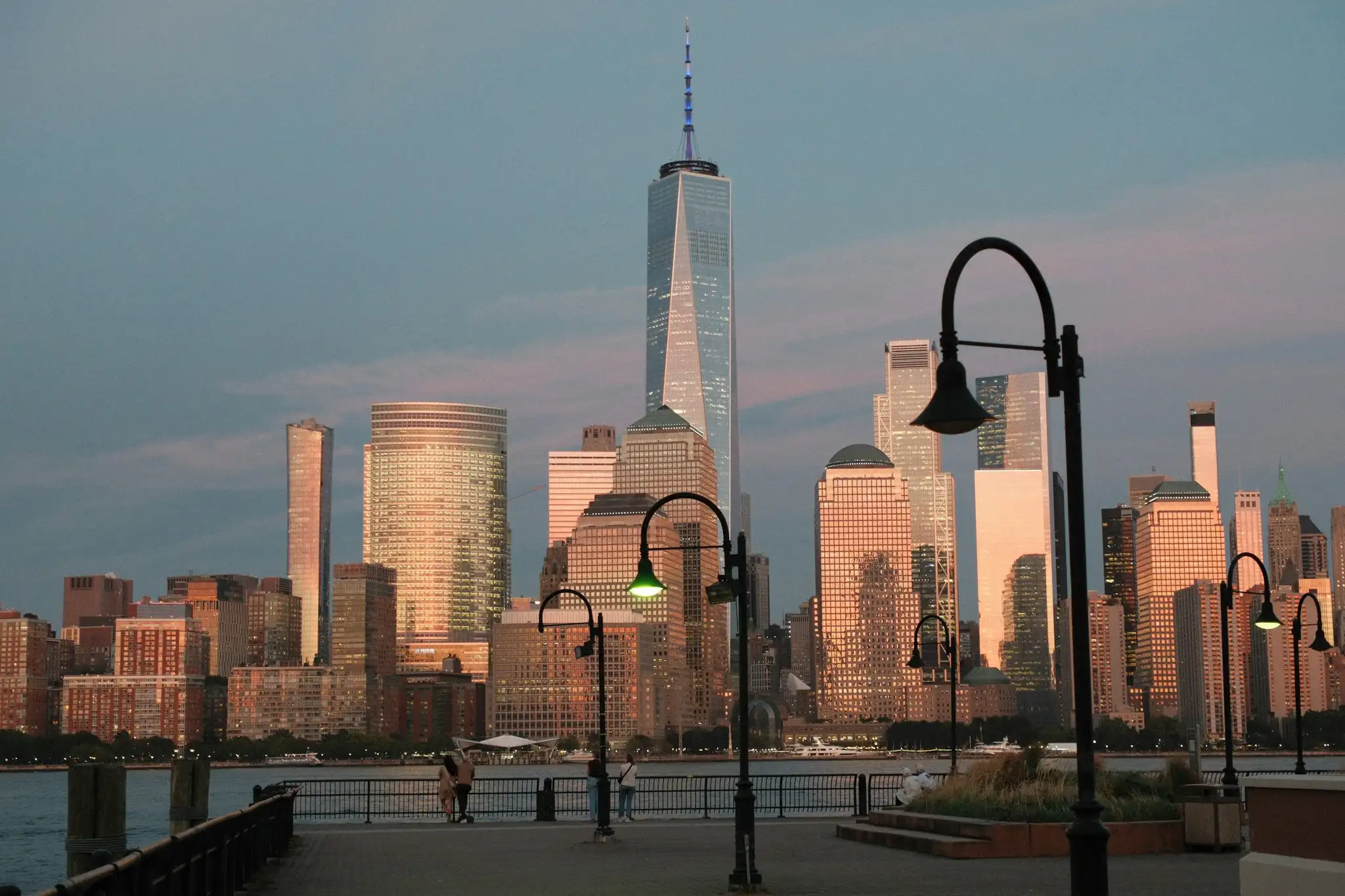 Office towers at dusk, seen across the water